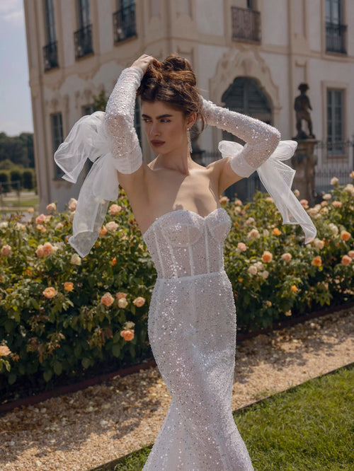 Sequin corset Ricca Sposa Elisa mermaid wedding dress with tulle bow gloves, bespoke handcrafted bridal gown