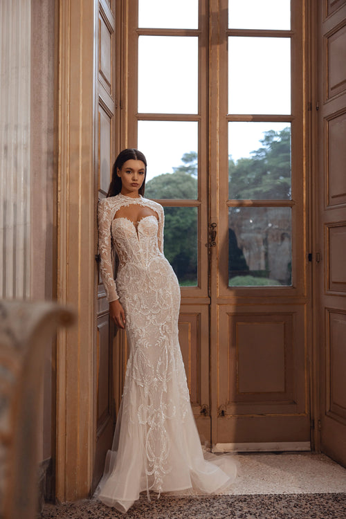 Handcrafted lace mermaid wedding dress with long sleeves and cutout neckline Ricca Sposa Diore bridal gown