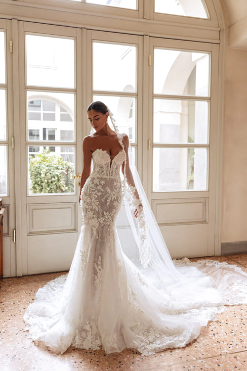 Mermaid wedding gown with handcrafted floral lace and a strapless plunging neckline, Ricca Sposa Amira bridal gown
