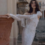 Sequin sheath Ricca Sposa Elisa wedding dress with corset bodice, tulle bow and long sleeves, bespoke bridal gown