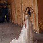 Bespoke A-line sweetheart wedding dress with a corset bodice and vine-patterned tulle, Ricca Sposa Anetta bridal gown