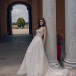 Bespoke A-line bridal gown with sheer corset bodice and textured tulle skirt, Ricca Sposa Anetta wedding dress