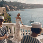 Mermaid lace wedding gown with off-the-shoulder corset bodice and floral sleeves, bespoke Ricca Sposa Noemi bridal gown