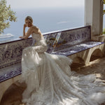 Shimmering Vincenza mermaid wedding dress with strapless neckline and ruffled train, a bespoke Ricca Sposa bridal gown