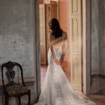 Bespoke lace mermaid wedding gown with sheer corset back and train, handcrafted Ricca Sposa bridal gown