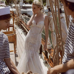 Beaded mermaid wedding gown with sunburst sequins and a sheer bodice, bespoke Ricca Sposa Celia bridal gown