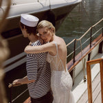 Handcrafted beaded mermaid wedding gown with a low back and sheer illusion details, Ricca Sposa Celia bridal gown