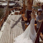 Bespoke beaded mermaid Ricca Sposa Celia wedding dress with low back and long train, handcrafted bridal gown