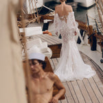 Mermaid floral lace wedding gown with off-the-shoulder puff sleeves and illusion back, handcrafted bridal gown