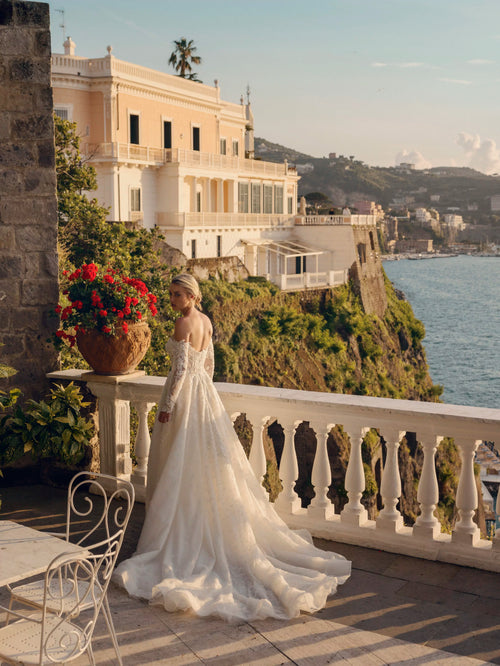 Off-the-shoulder lace ballgown with long sleeves and train, bespoke Ricca Sposa Calvino wedding gown