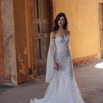 Bespoke strapless mermaid wedding dress with beaded lace and detached off-the-shoulder draped sleeves bridal gown