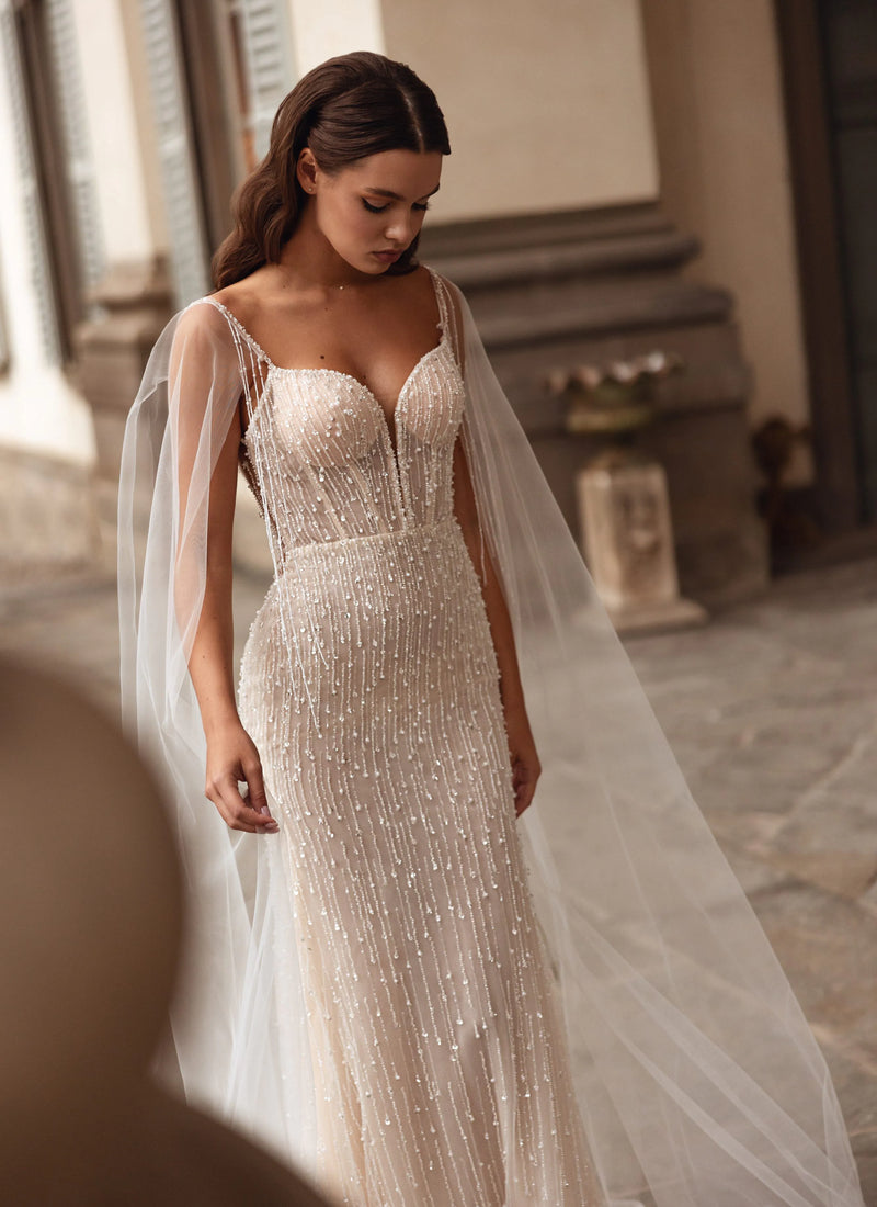 Beaded sheath wedding dress with sweetheart bodice and tulle cape, bespoke Ricca Sposa Orlena handcrafted bridal gown