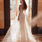 Mermaid lace wedding gown with a corset back, high neck, and cape, handcrafted Ricca Sposa bespoke bridal gown