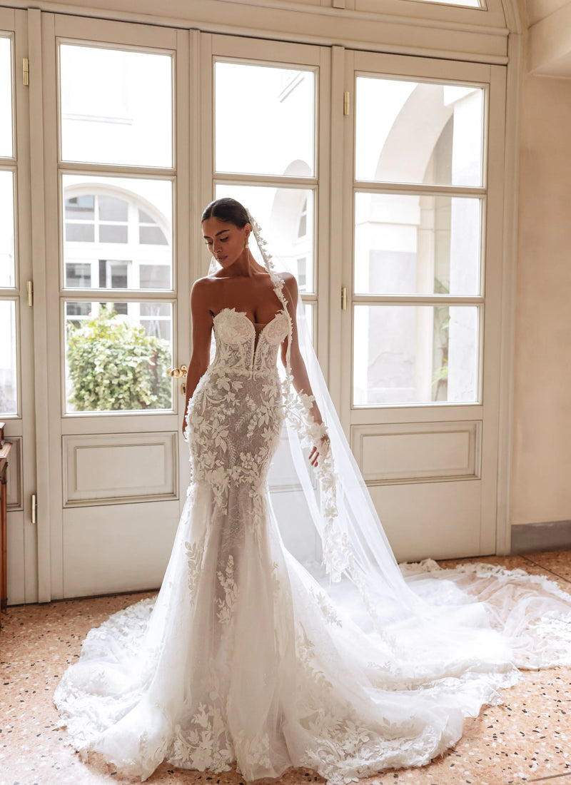 Mermaid wedding gown with handcrafted floral lace and a strapless plunging neckline, Ricca Sposa Amira bridal gown