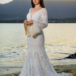 Boho mermaid crochet lace wedding dress with bell sleeves and deep V-neck, handcrafted bohemian bridal gown