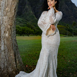 Boho mermaid crochet lace wedding dress with bell sleeves and deep V-neck, handcrafted bohemian bridal gown