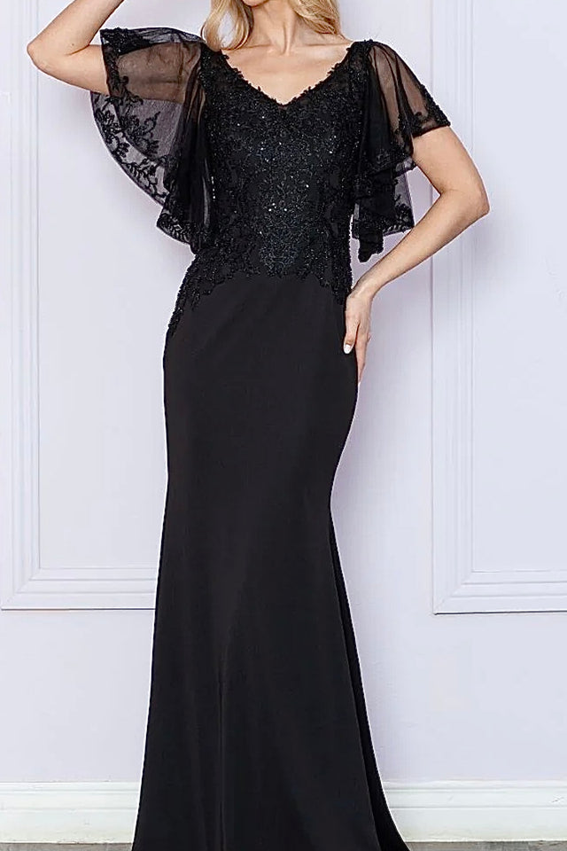 Black lace V-neck mermaid gown with sheer flutter sleeves, a bespoke handcrafted mother of the bride wedding dress