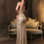 Bespoke gold shimmer mermaid gown with lace-up corset back and off-the-shoulder lace bodice, handcrafted wedding gown