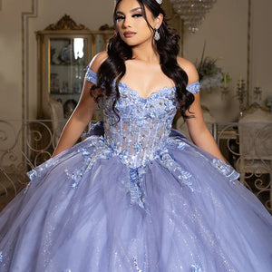 Bespoke periwinkle ball gown with floral lace and sheer corset bodice, handcrafted wedding gown