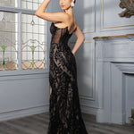 Handcrafted black sequin strapless dress with sheer corset side panels and lace details, bespoke bridal gown