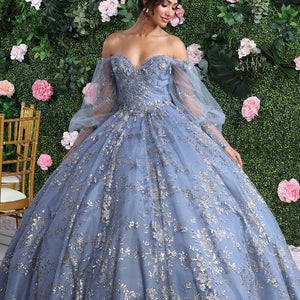 Bespoke blue Quinceañera ball gown with silver floral beading and sheer puff sleeves, handcrafted wedding gown