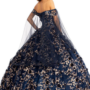 Navy Quinceañera ball gown with gold floral embroidery and cape sleeves, handcrafted bespoke bridal gown