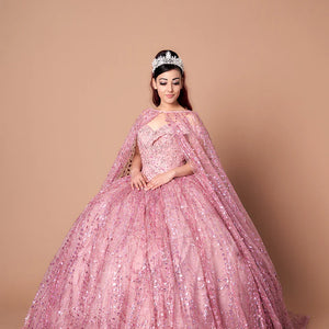 Sparkly pink ball gown with matching sheer cape and sweetheart neckline, handcrafted bespoke bridal gown