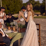 A-line floral lace wedding gown with a low open back and tulle skirt, bespoke Ricca Sposa Benedetta bridal gown