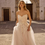 Strapless floral lace Ricca Sposa 08 A-line gown with sweetheart corset and tulle skirt, bespoke wedding dress