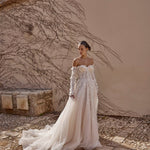Bespoke off-the-shoulder A-line wedding dress with 3D floral lace and sheer corset bodice, handcrafted bridal gown