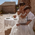 Off-the-shoulder ball gown with 3D floral lace appliqués and tulle skirt, bespoke Ricca Sposa 04 bridal gown