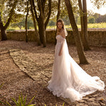 Lace A-line bridal gown with sheer sleeves and long train, bespoke Ricca Sposa Adelina handcrafted wedding dress