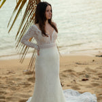 Lace mermaid wedding dress with long sleeves and deep plunging neckline, handcrafted bespoke bridal gown
