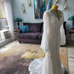Lace mermaid wedding dress with long bell sleeves and scalloped V-neck, handcrafted boho bridal gown