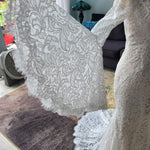 Bespoke boho mermaid lace wedding dress with long bell sleeves and scalloped V-neck, handcrafted bridal gown