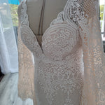 Boho mermaid crochet lace wedding dress with deep V-neck and bell sleeves, bespoke handcrafted bridal gown