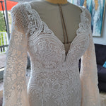 Bespoke boho mermaid crochet lace wedding dress with deep V-neck and bell sleeves, handcrafted bridal gown