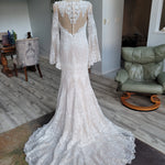 Boho mermaid crochet lace wedding dress with bell sleeves and illusion button back, handcrafted bridal gown