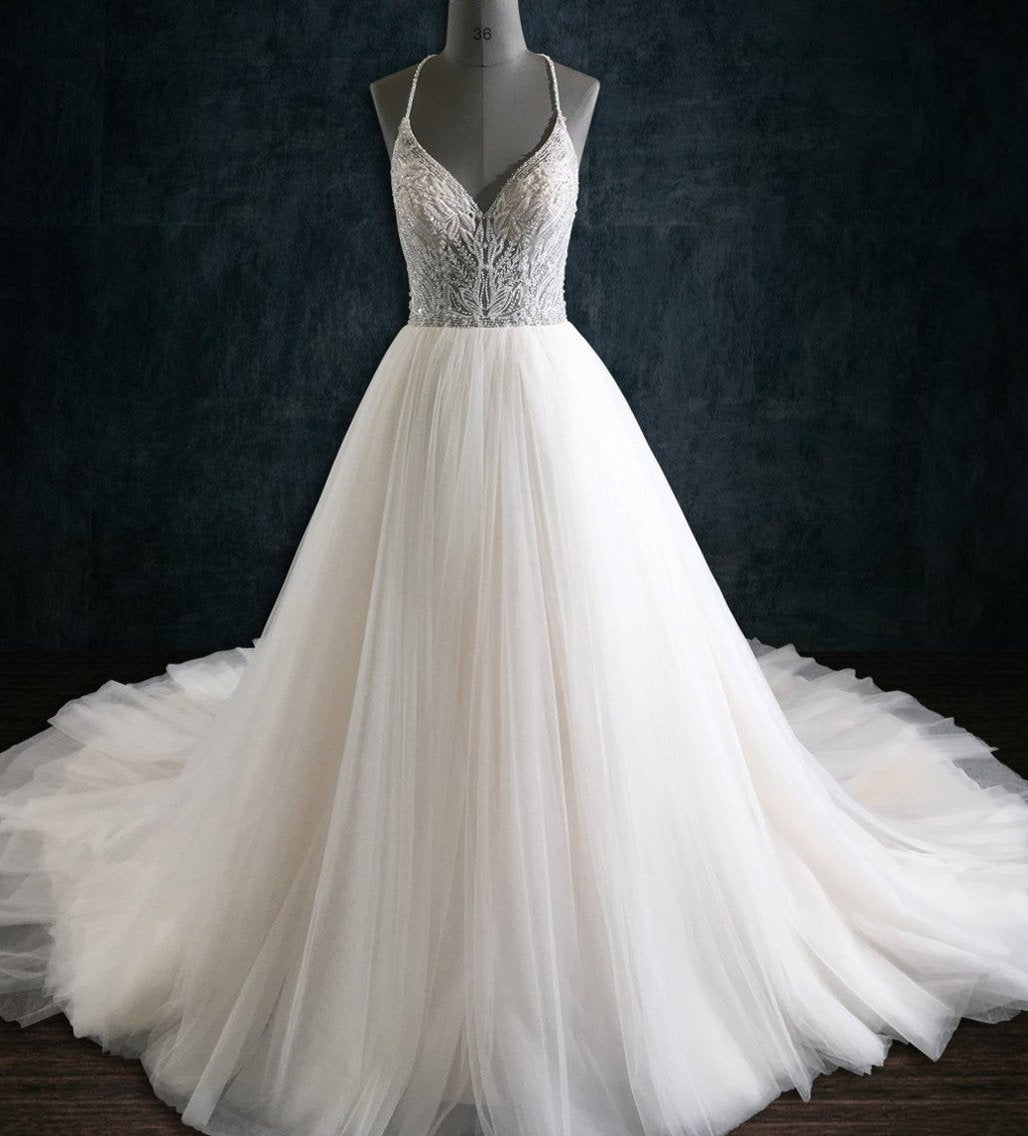 A-Line Wedding Dress with Beaded Lace Bodice Spaghetti Straps and Tulle Skirt | Dresses By Linda and Agnes A-Line Wedding Dress with Beaded Lace Bodice Spaghetti Straps and Tulle Skirt | Dresses By Linda and Agnes