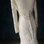 Beaded boho lace mermaid wedding dress with long sleeves and an illusion button back, bespoke handcrafted bridal gown