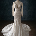 Beaded lace mermaid wedding dress with sheer long sleeves and a plunging V-neck, handcrafted boho bridal gown