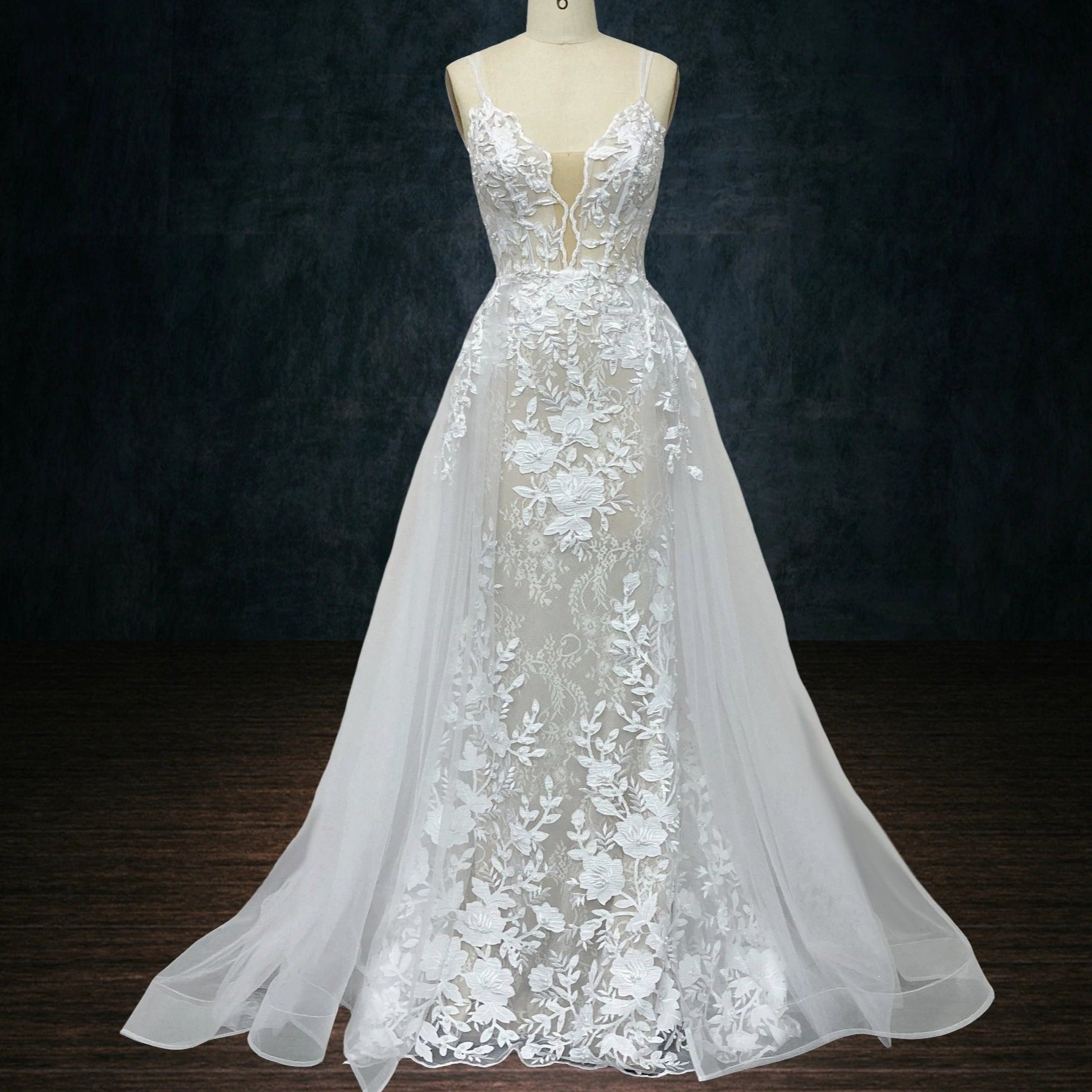 Lace Mermaid A-Line Wedding Dress with Removable Skirt Train Spaghetti Straps and Deep Plunging Neckline | Dresses By Linda and Agnes Lace Mermaid A-Line Wedding Dress with Removable Skirt Train Spaghetti Straps and Deep Plunging Neckline | Dresses By Linda and Agnes